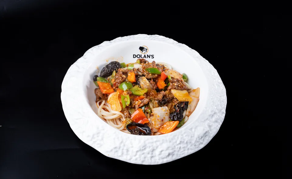Hand-pulled laghman noodles with stir-fried lamb and vegetables at Dolan's Uyghur Cuisine